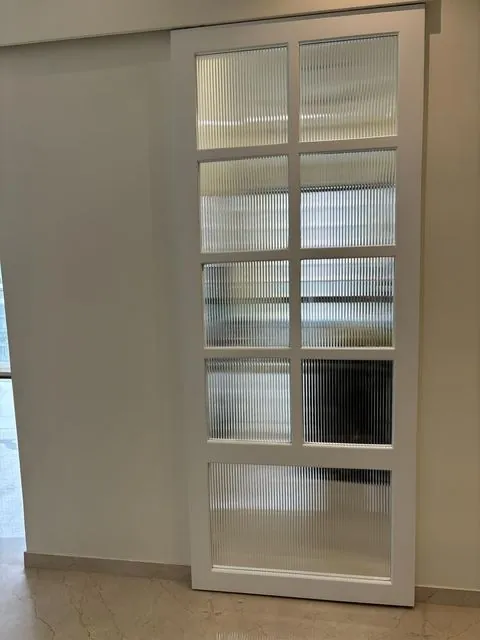 Fluted glass sliding door finish