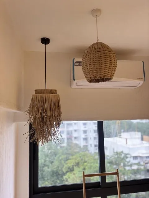 Textured ceiling with rattan pendant lights
