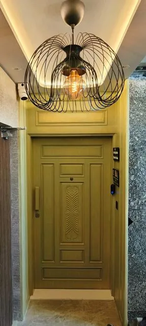 Entrance door painting with pendant light