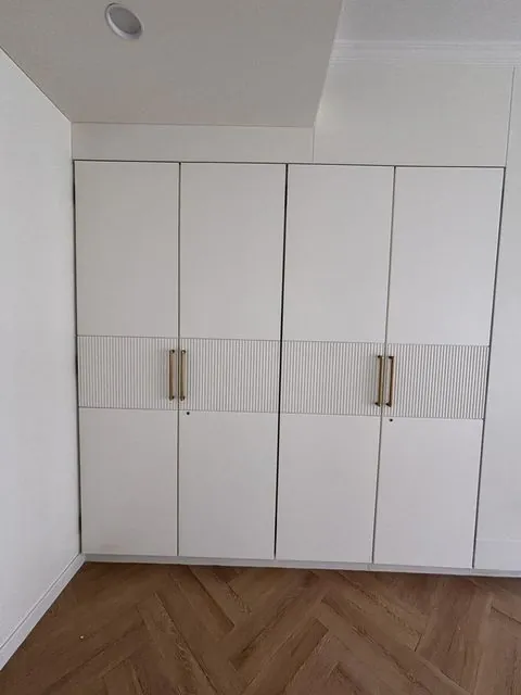 Wardrobe painting with fluted detail