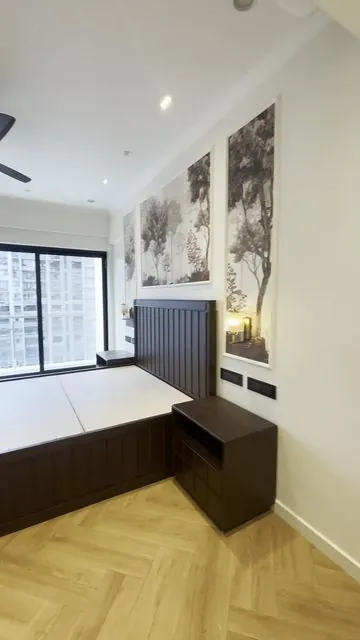 Bedroom with wallpaper and side table